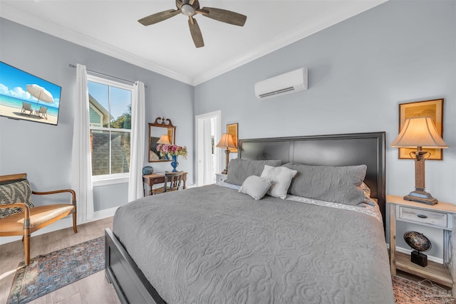 bedroom featuring a wall mounted air conditioner, ceiling fan, crown molding, and light hardwood / wood-style flooring