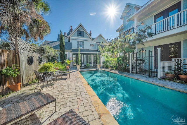 view of swimming pool featuring a patio