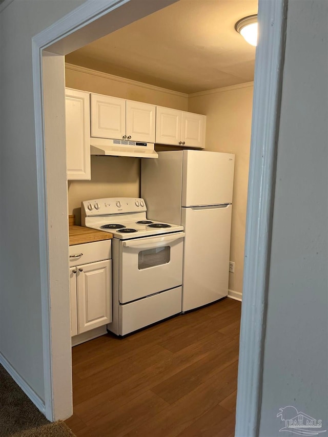 kitchen with dark wood-type flooring, white cabinetry, crown molding, and white appliances