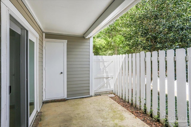 view of patio / terrace featuring fence