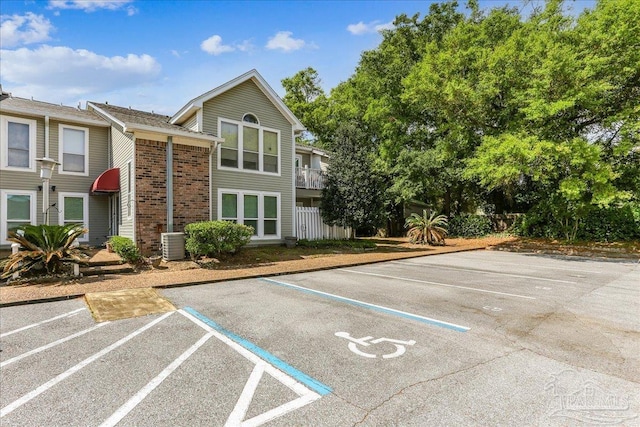 uncovered parking lot with fence