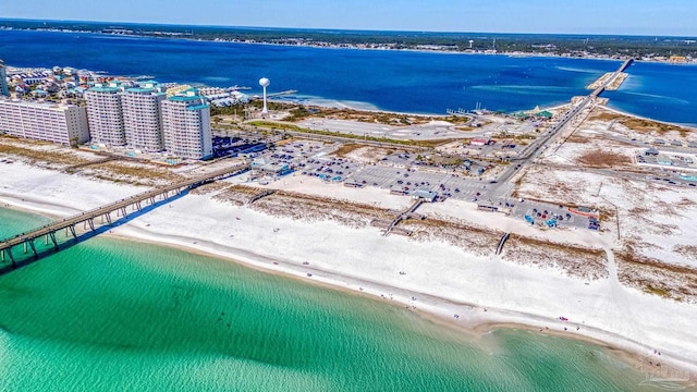 aerial view featuring a water view and a beach view