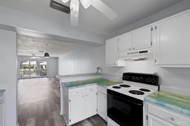 kitchen featuring electric range, dark hardwood / wood-style floors, white cabinetry, and ceiling fan