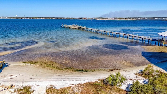 bird's eye view featuring a water view and a view of the beach