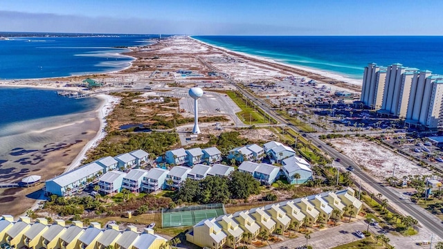 birds eye view of property featuring a view of the beach and a water view