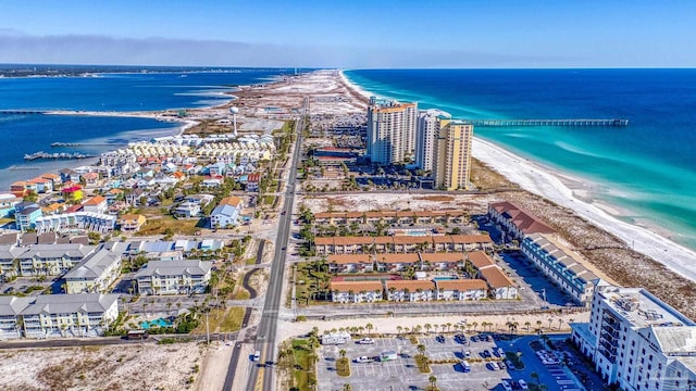 birds eye view of property featuring a view of the beach and a water view