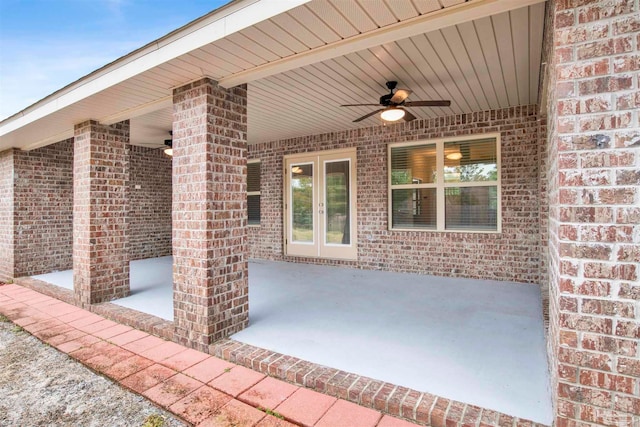 view of patio / terrace featuring ceiling fan and french doors