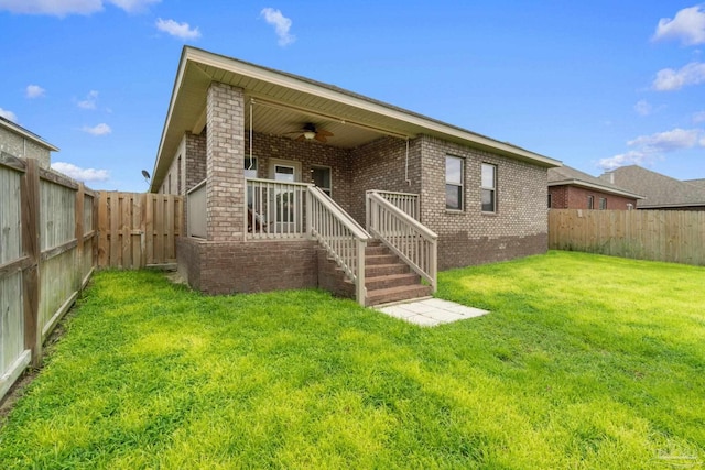 1777 Waterford Sound Blvd, Gulf Breeze, FL 32563 - rear view of property featuring a ceiling fan and brick siding