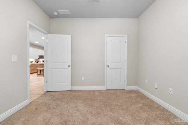 1777 Waterford Sound Blvd, Gulf Breeze, FL 32563 - unfurnished bedroom featuring light colored carpet and baseboards