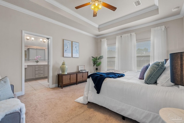 1777 Waterford Sound Blvd, Gulf Breeze, FL 32563 - bedroom featuring light colored carpet, a raised ceiling, crown molding, baseboards, and ensuite bathroom