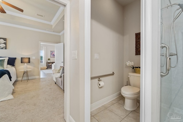 1777 Waterford Sound Blvd, Gulf Breeze, FL 32563 - bathroom with ornamental molding, a stall shower, toilet, a ceiling fan, and connected bathroom