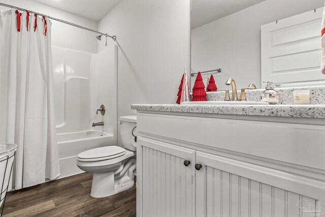 full bathroom with shower / bath combination with curtain, vanity, toilet, and wood-type flooring