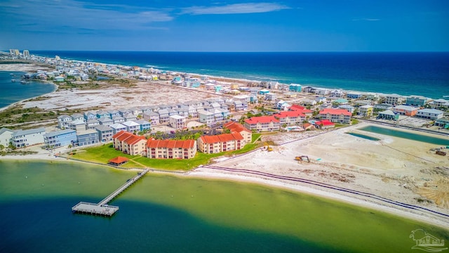 aerial view with a water view and a view of the beach