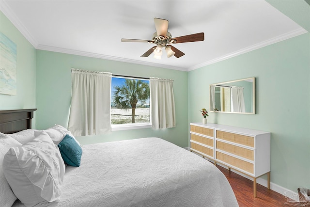 bedroom featuring ornamental molding, hardwood / wood-style floors, and ceiling fan