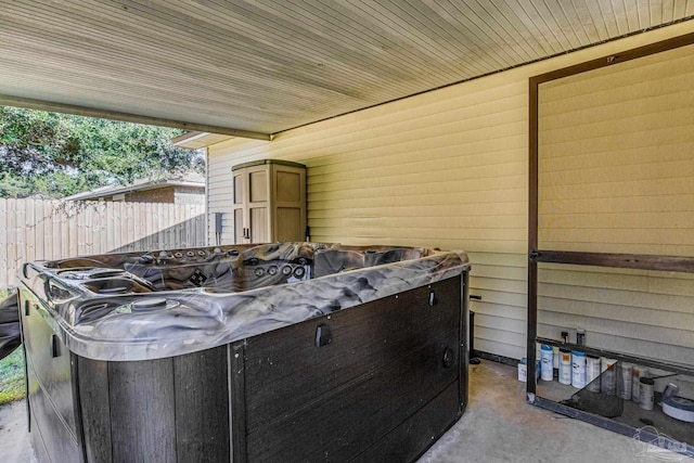 view of patio / terrace featuring a hot tub