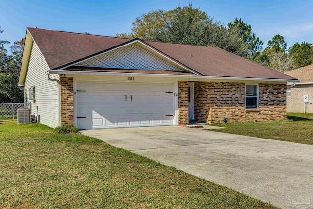 ranch-style home with central AC unit, a garage, and a front lawn