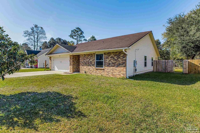 ranch-style home with a front yard and a garage