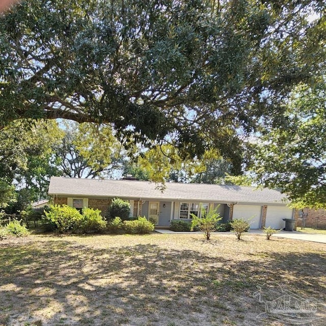 ranch-style home with a garage