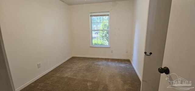 view of carpeted spare room