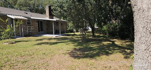 view of yard with a patio