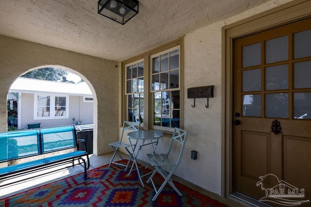 entrance to property featuring an indoor pool