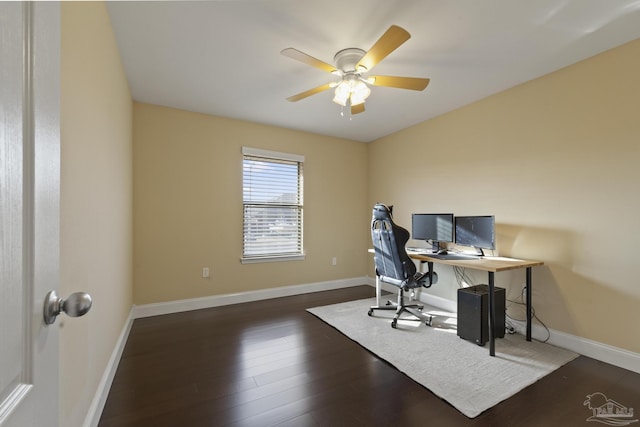 office with dark wood-type flooring and ceiling fan