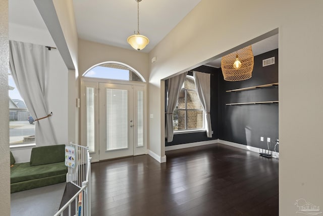 entrance foyer featuring dark wood-type flooring