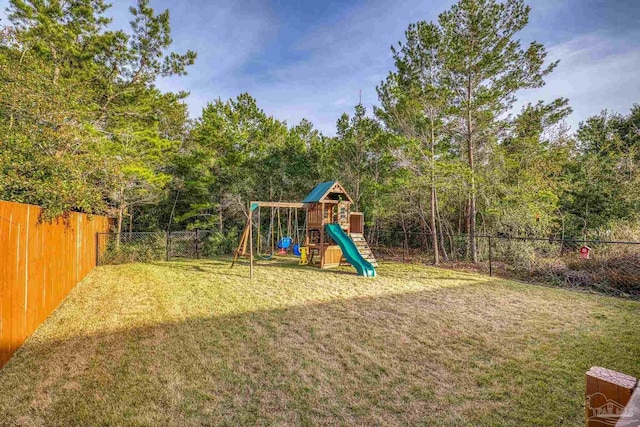 view of play area featuring a lawn