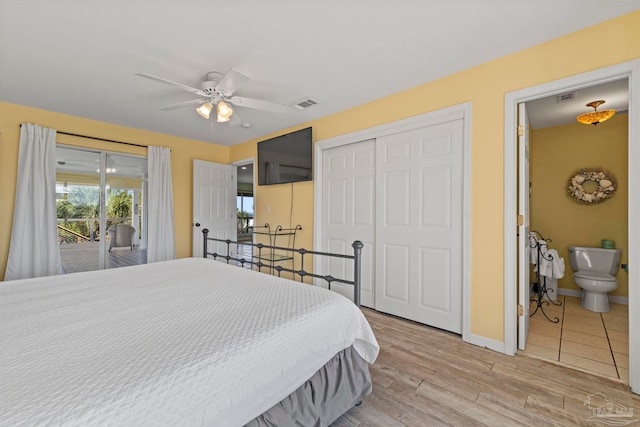 1113 Via Deluna Dr, Pensacola Beach, FL 32561 - bedroom featuring visible vents, connected bathroom, light wood-style floors, and access to exterior