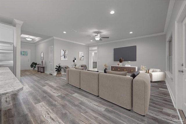 6621 Rocky Shores Rd, Milton, FL 32583 - living area featuring a ceiling fan, recessed lighting, crown molding, light wood finished floors, and baseboards