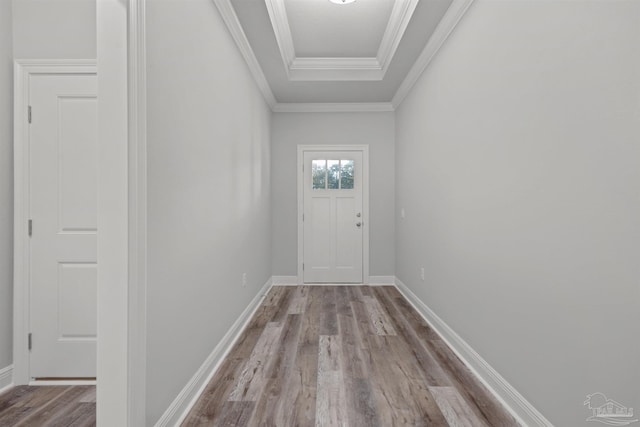 6621 Rocky Shores Rd, Milton, FL 32583 - doorway to outside featuring wood finished floors, baseboards, and crown molding
