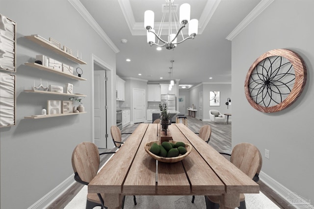 6621 Rocky Shores Rd, Milton, FL 32583 - dining space featuring ornamental molding, a chandelier, baseboards, light wood-style floors, and recessed lighting