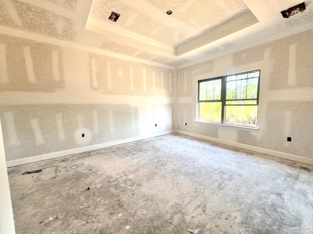 6621 Rocky Shores Rd, Milton, FL 32583 - spare room with a raised ceiling, baseboards, and ornamental molding