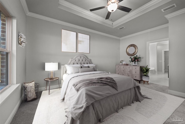 6621 Rocky Shores Rd, Milton, FL 32583 - carpeted bedroom featuring a raised ceiling, ornamental molding, baseboards, and a ceiling fan