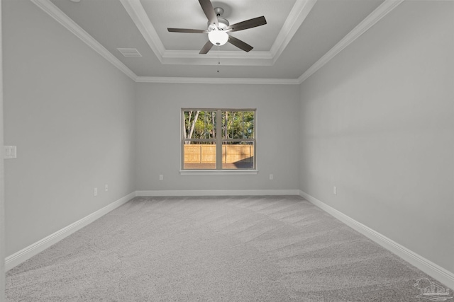 6621 Rocky Shores Rd, Milton, FL 32583 - empty room featuring a tray ceiling, carpet floors, ceiling fan, crown molding, and baseboards