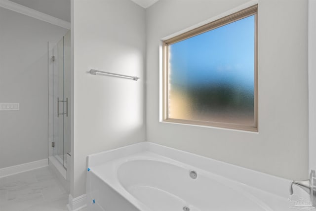 6621 Rocky Shores Rd, Milton, FL 32583 - bathroom with a garden tub, a shower stall, marble look tile flooring, and baseboards