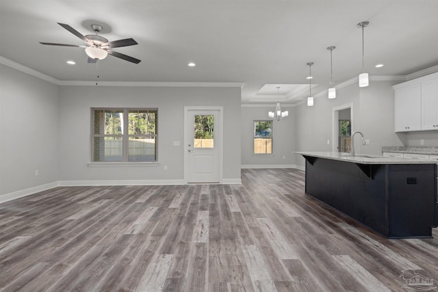 6621 Rocky Shores Rd, Milton, FL 32583 - kitchen featuring open floor plan, a sink, recessed lighting, a chandelier, and white cabinets