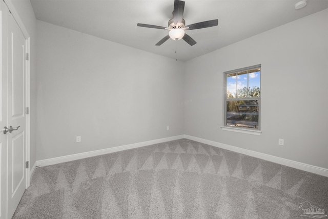 6621 Rocky Shores Rd, Milton, FL 32583 - carpeted empty room featuring baseboards, ceiling fan, and a smoke detector