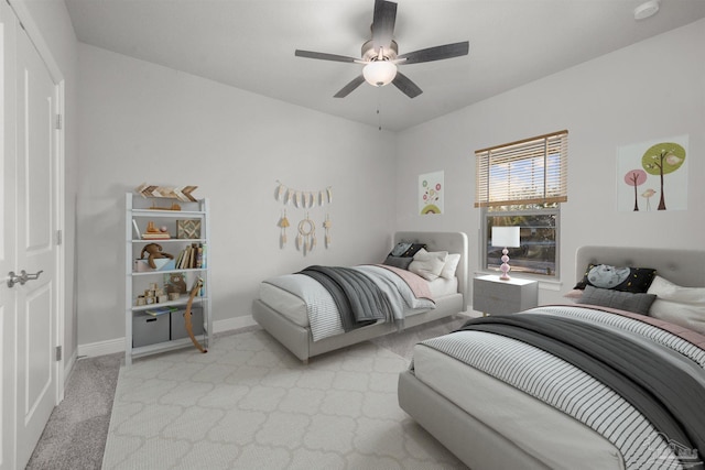 6621 Rocky Shores Rd, Milton, FL 32583 - bedroom featuring light carpet, baseboards, and a ceiling fan