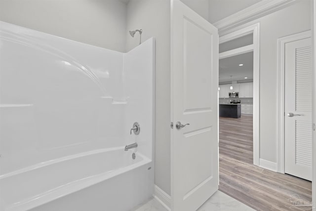 6621 Rocky Shores Rd, Milton, FL 32583 - bathroom with shower / washtub combination and baseboards