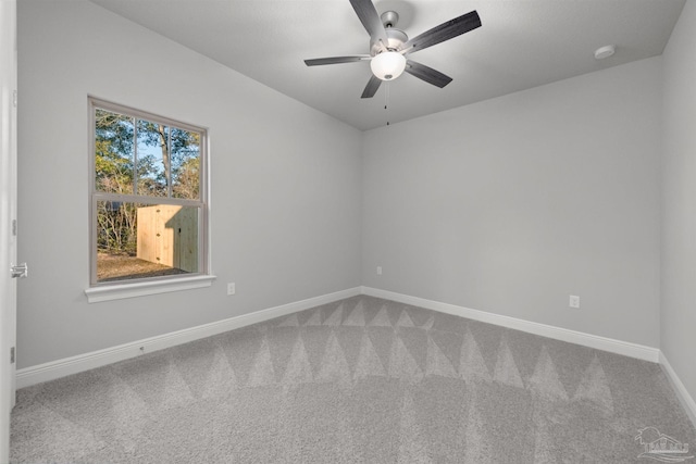 6621 Rocky Shores Rd, Milton, FL 32583 - carpeted empty room featuring baseboards, ceiling fan, and a smoke detector