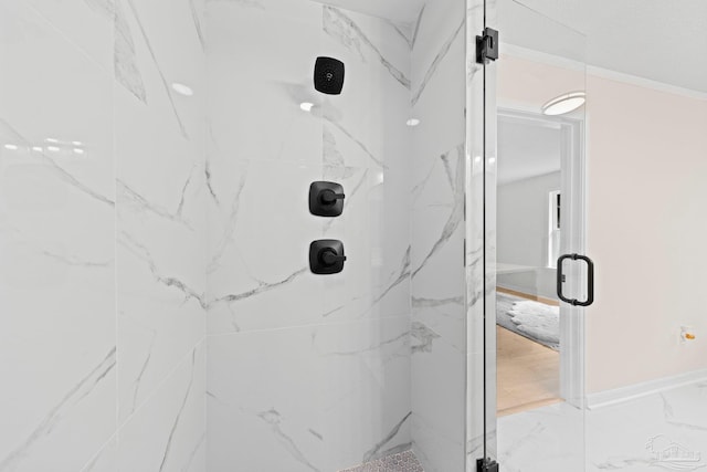 2512 N 8th Ave, Pensacola, FL 32503 - full bath featuring a marble finish shower, marble look tiles, and baseboards