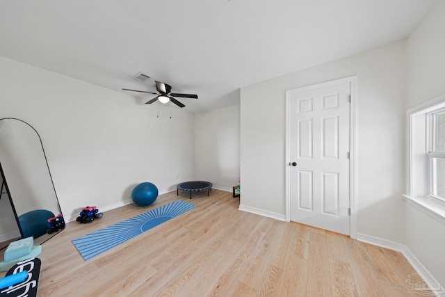 2512 N 8th Ave, Pensacola, FL 32503 - exercise room featuring wood finished floors, a ceiling fan, and baseboards