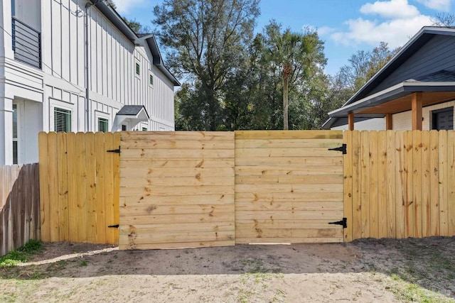 view of yard with a gate and fence