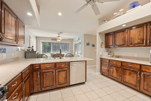 9638 Wills Ln, Lillian, AL 36549 - kitchen with stainless steel appliances, a ceiling fan, light tile patterned flooring, light countertops, and recessed lighting