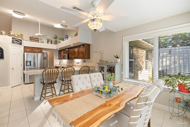 9638 Wills Ln, Lillian, AL 36549 - dining room with a ceiling fan, light tile patterned floors, and baseboards