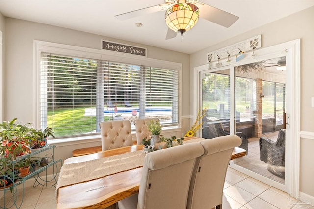 9638 Wills Ln, Lillian, AL 36549 - dining space featuring a ceiling fan, light tile patterned floors, and healthy amount of natural light