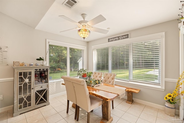 9638 Wills Ln, Lillian, AL 36549 - dining space with healthy amount of natural light, light tile patterned floors, and baseboards