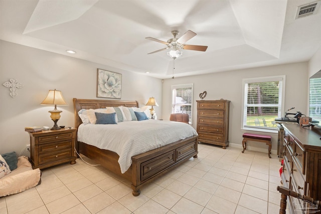 9638 Wills Ln, Lillian, AL 36549 - bedroom with a raised ceiling, light tile patterned floors, multiple windows, a ceiling fan, and recessed lighting