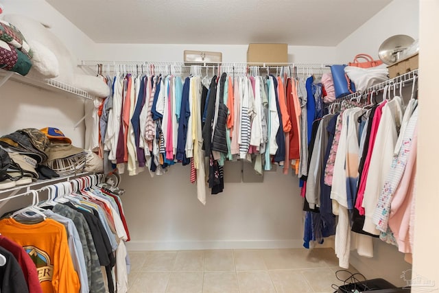 9638 Wills Ln, Lillian, AL 36549 - walk in closet featuring tile patterned floors